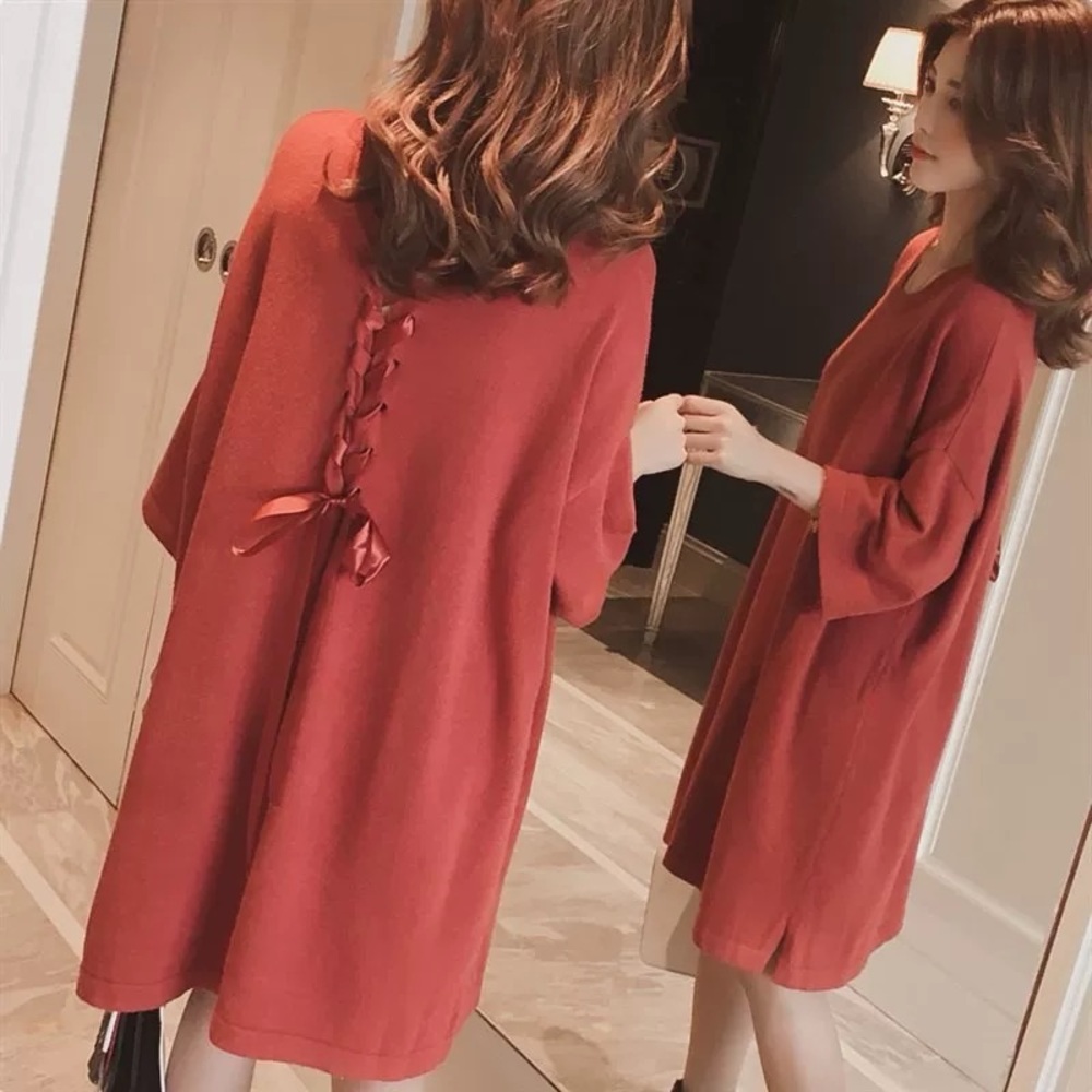 Elegant Red Sweater with Back Tie Detail, lightly used. Oversized & fits all